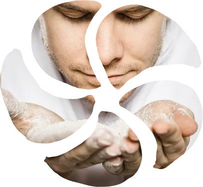 A man closely examines flour in his hands, with the image artistically divided into four curved sections, creating a dynamic, abstract effect that hints at the craft and precision of a Bäckerei.
