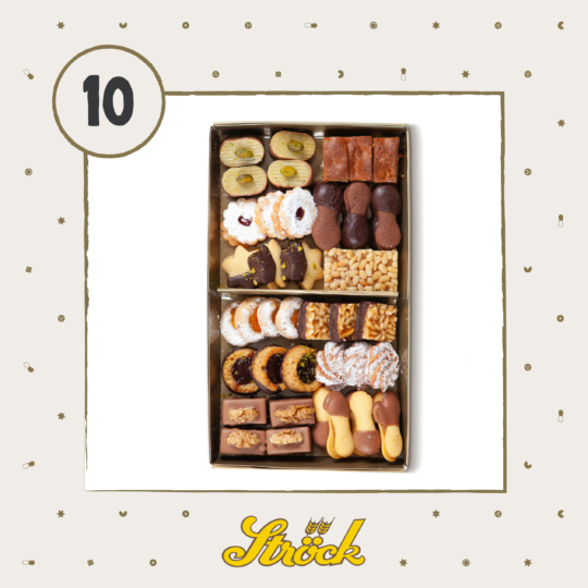 A rectangular box filled with assorted cookies and biscuits, arranged in rows, sits on a beige background with small decorative dots. The number 10 is in a circle at the top left, and Ströck is written at the bottom.