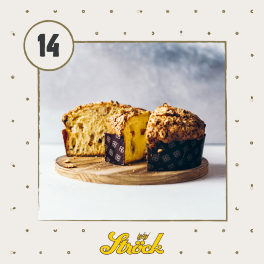 A sliced loaf of panettone with a crumbly topping sits on a wooden board. The background is light, with a number 14 in a circle and the word Ströck in yellow at the bottom. Small icons decorate the border.